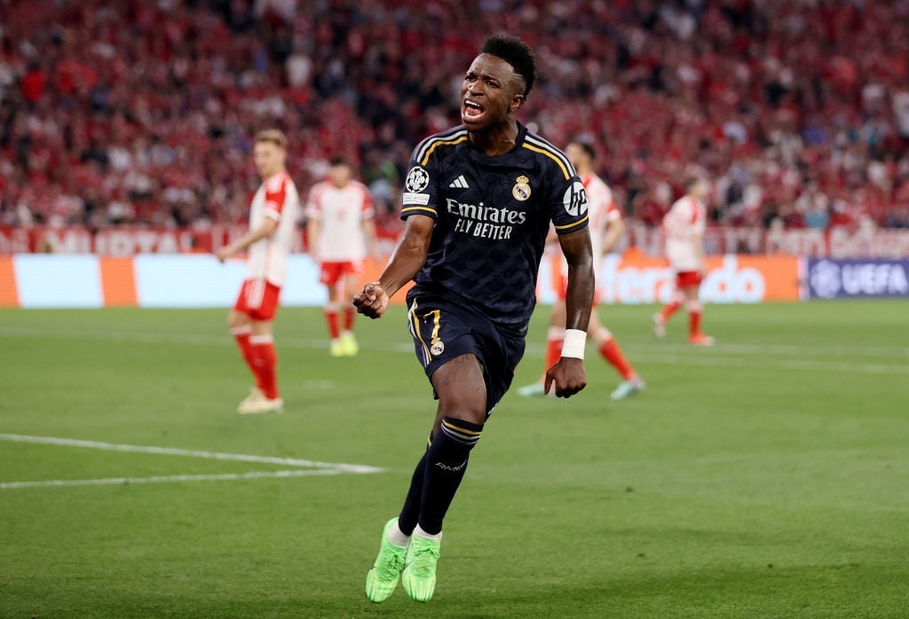 MUNICH, GERMANY - APRIL 30: Vinicius Junior of Real Madrid celebrates scoring his teams second goal during the UEFA Champions League semi-final first leg match between FC Bayern MÃ¼nchen and Real Madrid at Allianz Arena on April 30, 2024 in Munich, Germany. (Photo by Alex Pantling/Getty Images)
