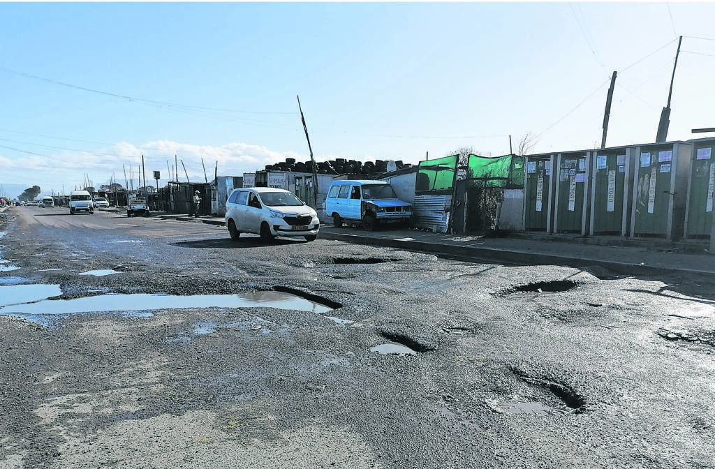 The dire state of some roads is of increasing concern to officials as they contribute to escalating cases of hijackings in the area. Pictured is Sheffield Road in Philippi. PHOTO: Unathi obose