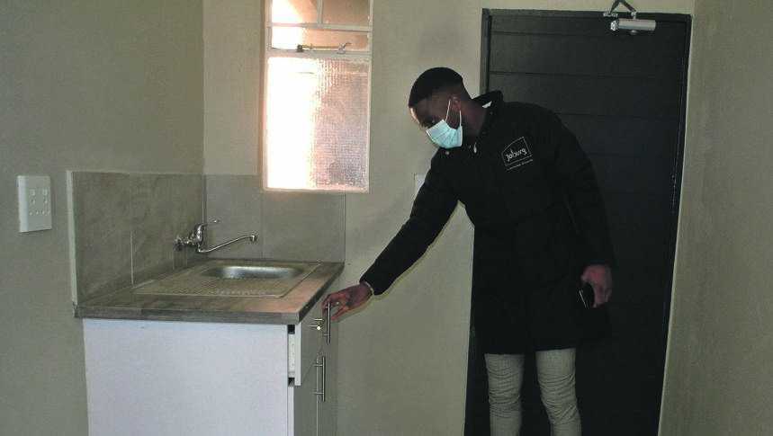 MMC Mlungisi Mabaso visited Fleurhof flats to check if they’re ready to be allocated to people.   Photo by Trevor Kunene