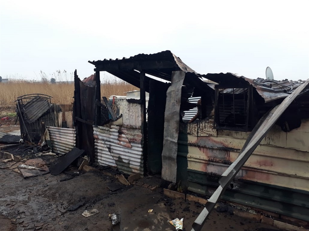 The remnants of a shack that caught fire in the Ramaphosa informal settlement in which two minors were killed.