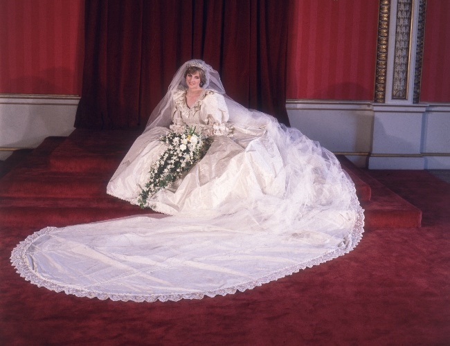 Princess Diana donning her iconic wedding dress.