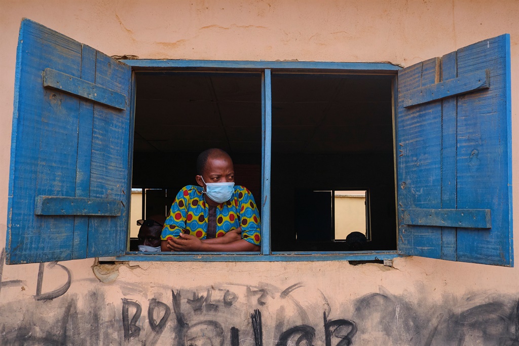 A man looks out the window at a venue in Ikorodu, Lagos. Picture: Adeyinka Yusuf/iStock