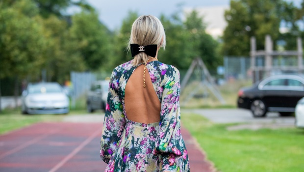 Aylin König wearing dress with floral print is seen outside Rotate during Copenhagen Fashion Week Spring/Summer 2020. (Photo by Christian Vierig/Getty Images)