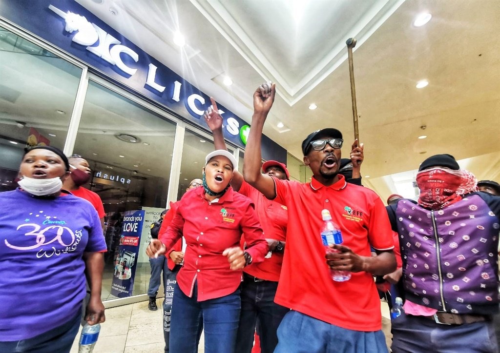 Members of the EFF at Clicks store at the Mall of Africa. Photo by Christopher Moagi
