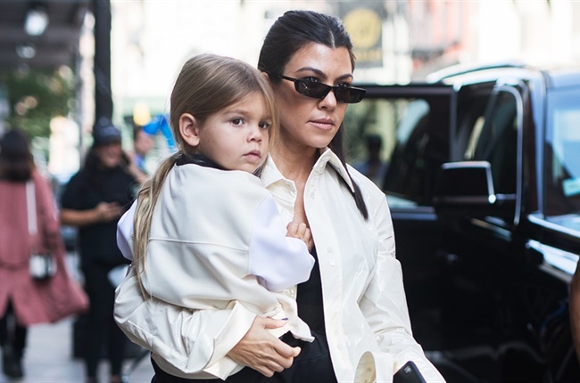 Designer baby! Kourtney Kardashian dresses daughter Penelope in