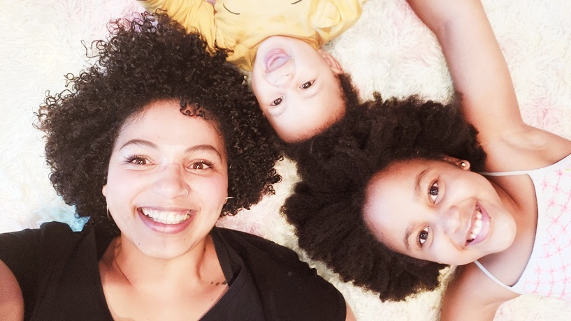 "I guess it all boils down to loving yourself and teaching our kids to love ALL of themselves, including their natural hair". (Supplied/Stephanie Mashigo) 
