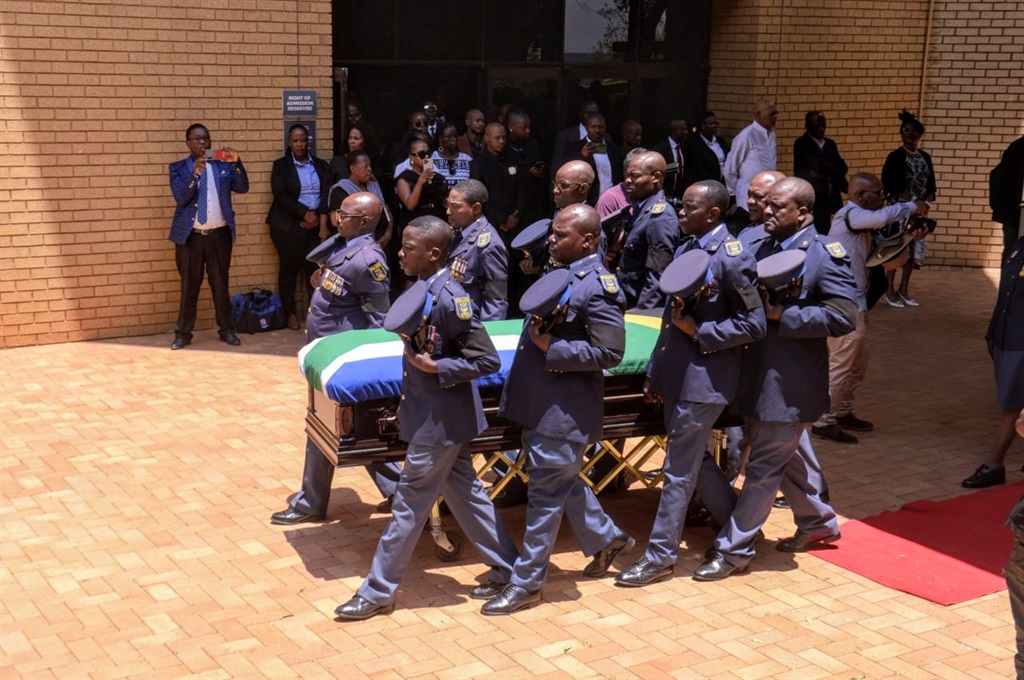 Mourners and government officials during the funer