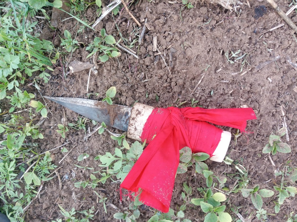 A knife wrapped in a red cloth was allegedly used to create a bad spell on someone. 