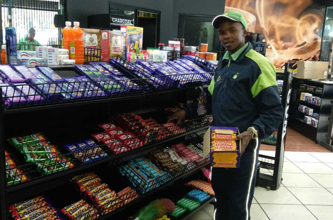 When Wiseman Ndabezitha isn't on the forecourt he is assisting inside the store (Photo: Supplied)