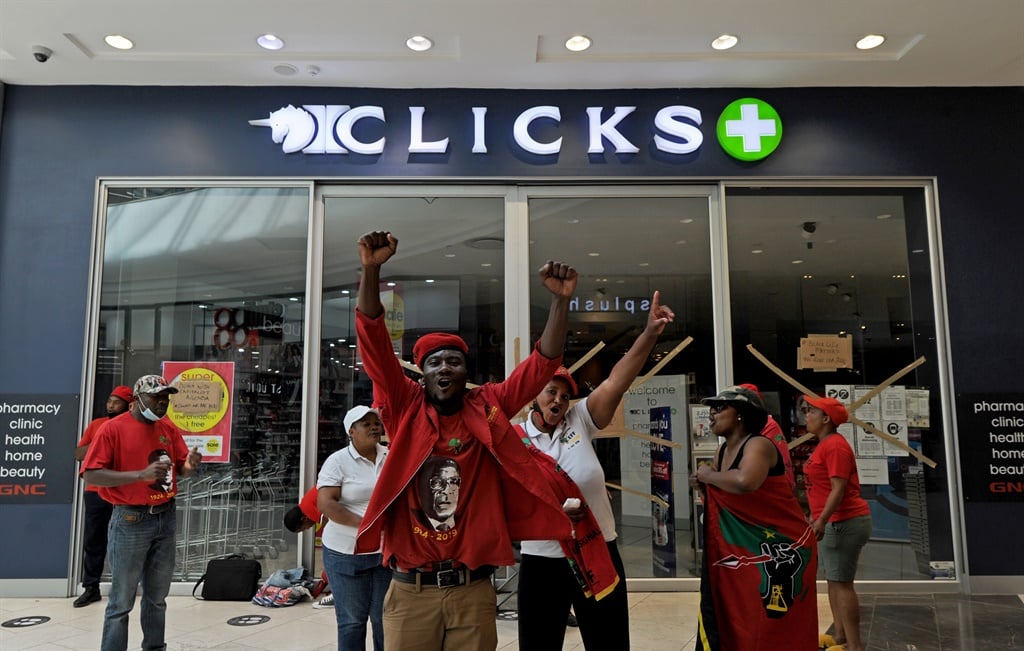 EFF members protesting outside a locked Clicks store at the Mall of Africa in Midrand in 2020. 
