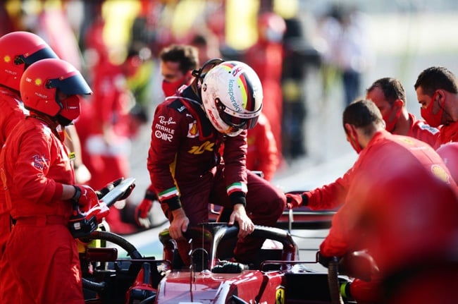 Sebastian Vettel climbs out of his car during a red flag period during the F1 Grand Prix of Tuscany at Mugello Circuit on September 13, 2020 in Scarperia, Italy. (Photo by Peter Fox/Getty Images)