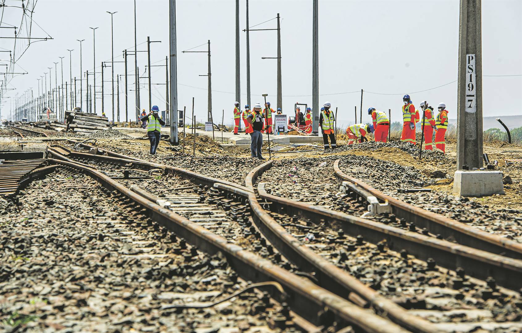 Workers working on the Majuba railway line near the power station.