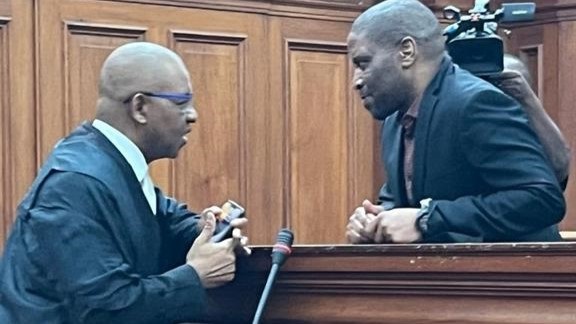 Parliament arson accused Zandile Mafe (right) has been declared unfired to stand trial. Pictured with him is his lawyer, Advocate Dali Mpofu.