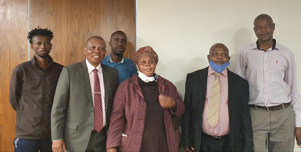 Herman Mashaba with family members of deceased Lily Mine workers and spokesperson of the families and mine workers . Picture: Palesa Dlamini/City Press