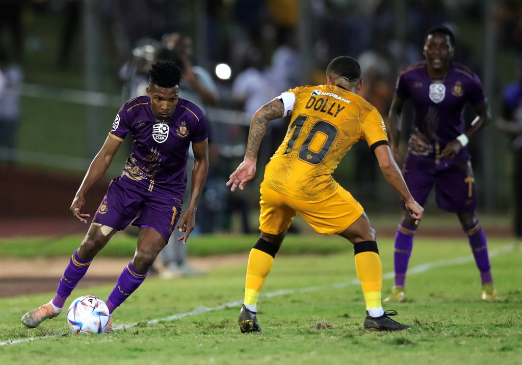 Shaune Mogaila of Royal AM challenged by Keegan Dolly of Kaizer Chiefs during the 2023 Nedbank Cup match between Royal AM and Kaizer Chiefs at Chatsworth Stadium in Durban on 16 April 2023 