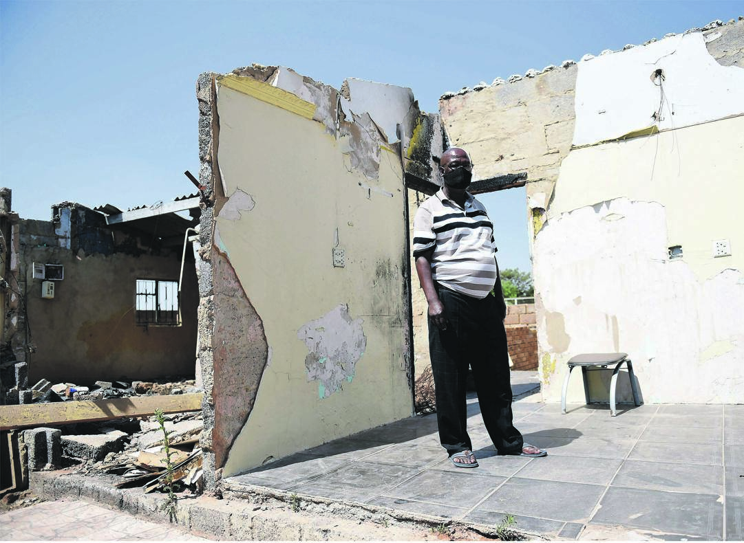 Bantam Matshogo wants money to rebuild their family home after it was torched last year when his brother Festus ‘Mchini’ Matshogo was petrol-bombed.              Photo by Christopher Moagi