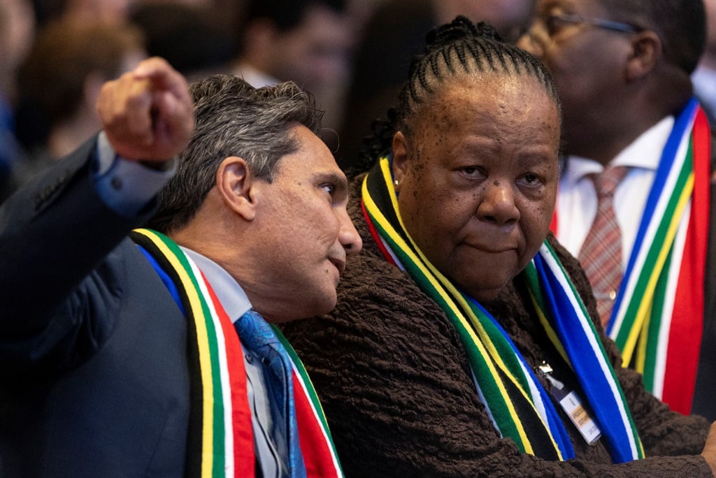 Naledi Pandor speaks with Zane Dangor, Director General of the South African department of International Relations and Cooperation at the International Court of Justice in The Hague. (Michel Porro/Getty Images)