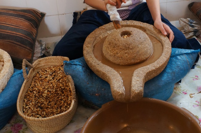 Moroccan worker preparing argan oil. (Getty Images)
