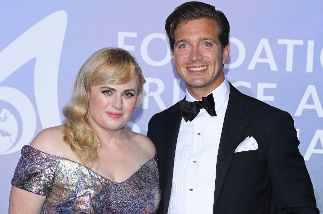 A slimmer Rebel Wilson with her new man, Jacob Busch.  (Photo: Gallo Images/Getty Images) 