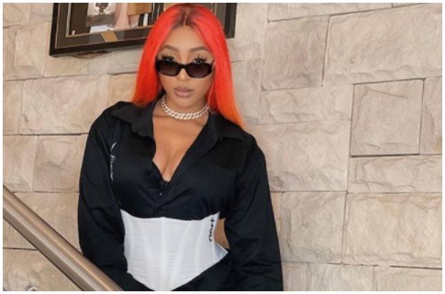 Nadia Nakai rocks the corset trend and gives it a street fashion look.