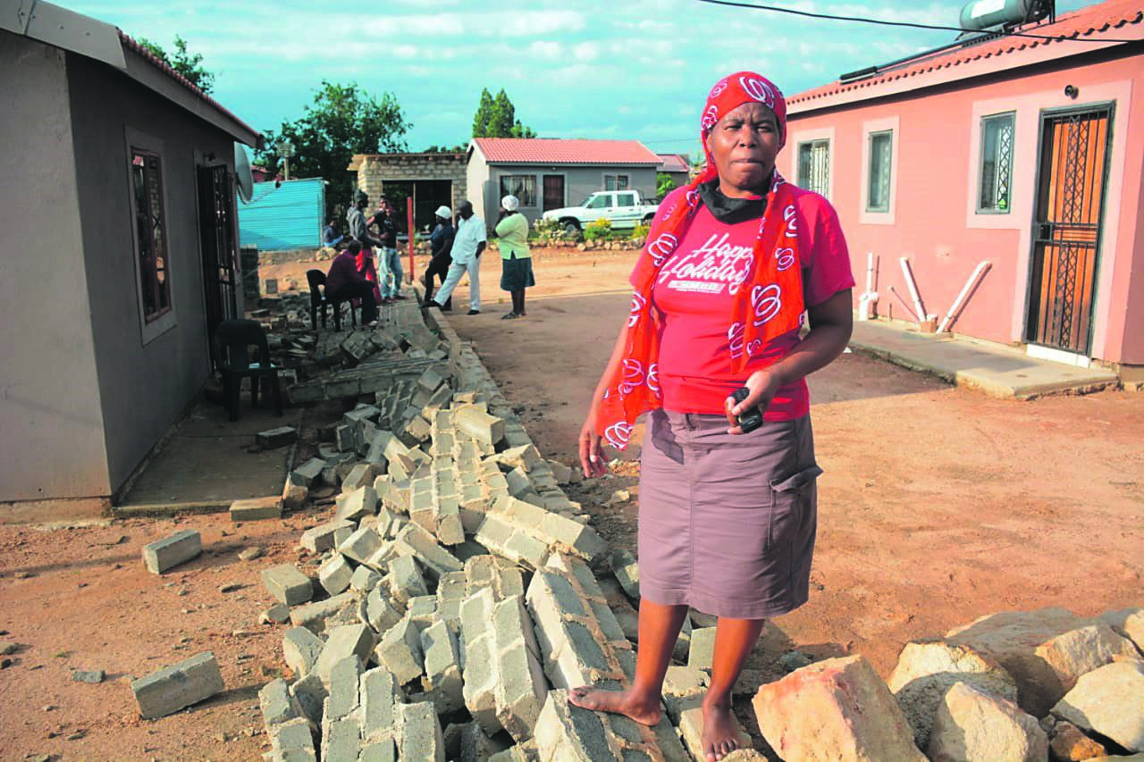 Margaret Molamu’s house and wall were allegedly vandalised by her in-laws who are fighting for an RDP house in Portion 9, Hammanskraal, Tshwane.                                  Photo by Raymond Morare