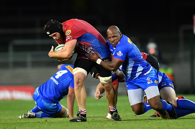 Ruben Schoeman of the Lions tackled by Bongi Mbonambi (Ashley Vlotman/Gallo)