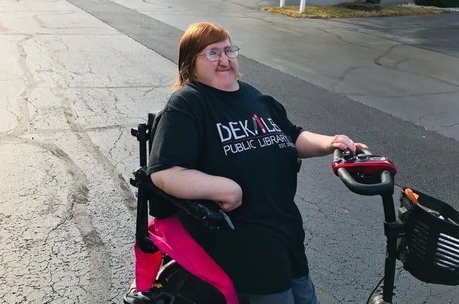 Although Melissa Blake can walk short distances with difficulty she uses an electric scooter to get around. PHOTO: INSTAGRAM/@MELISSABLAKE81