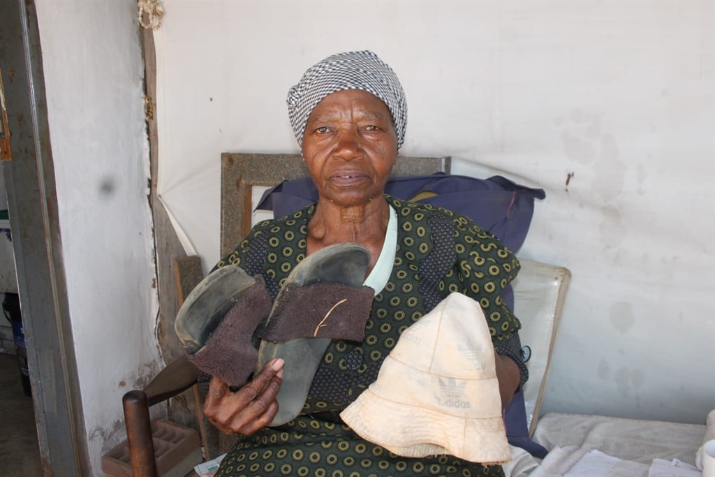 Gogo Emily Motaung found these flip flops at the spot where her grandson, Vusi Nkambule was kidnapped. Photo by Phineas Khoza
