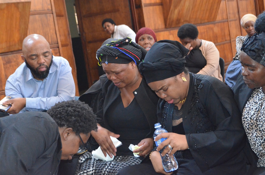 The family of Simnikiwe Mapini consoles each other