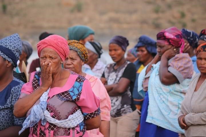 The residents from Zwelisha standing near the dam in Bergville where two girls drowned. Photo:  Supplied.