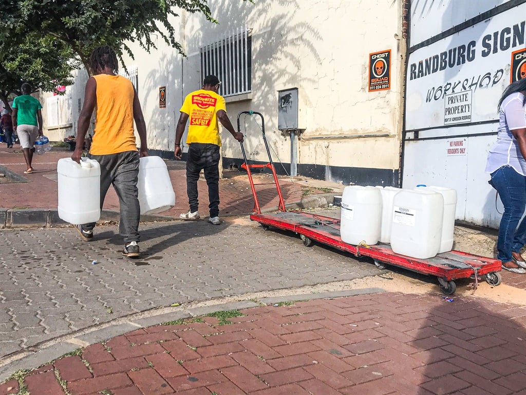 Randburg residents collecting borehole water from one of the churches in the area. (Alfonso Nqunjana/News24)
