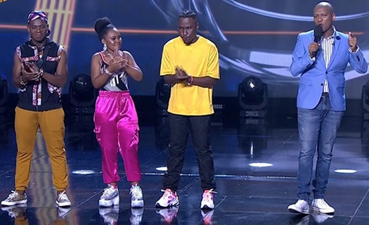 Idols SA 2020 Top 3 contestants, Mr Music, Zama and Brandon on stage with Idols SA show host ProVerb.