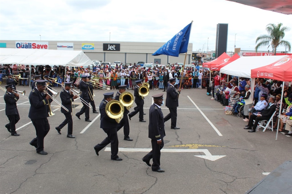 Shoppers and residents said they felt blessed and safe when they saw the ST. Engenas Zion Christian Church brass band.