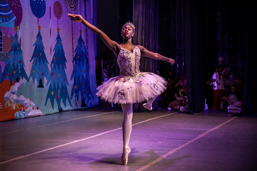 Dancer Lavender Orisa, 17, performs during the production of the 'Nutcracker', a classical ballet traditionally performed in the Christmas period, at the Kenya National Theatre in Nairobi on November 26, 2023. 