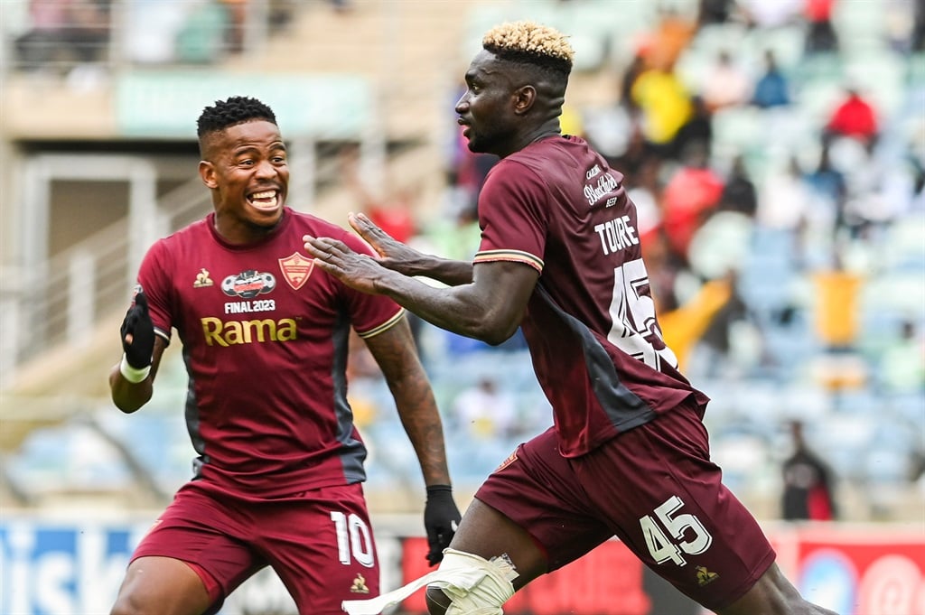 DURBAN, SOUTH AFRICA - DECEMBER 16: Ismael Toure of Stellenbosch FC celebrates scoring during the Carling Knockout, Final match between Stellenbosch FC and TS Galaxy at Moses Mabhida Stadium on December 16, 2023 in Durban, South Africa. (Photo by Darren Stewart/Gallo Images),p?VYårÆCé©
