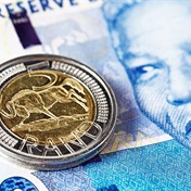Rand takes hit as early and steep US rate cut hopes fade
