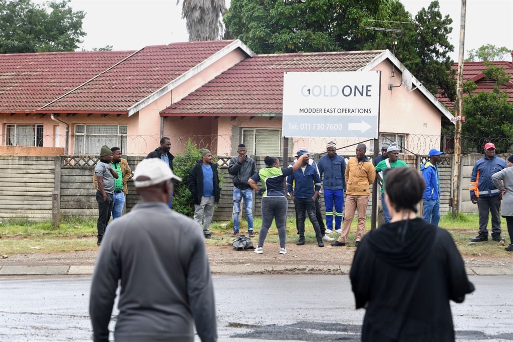 Miners from the Gold One mine in Springs in Johannesburg, who were trapped underground, left the mine piecemeal on Monday. The workers were held hostage from Thursday evening. 