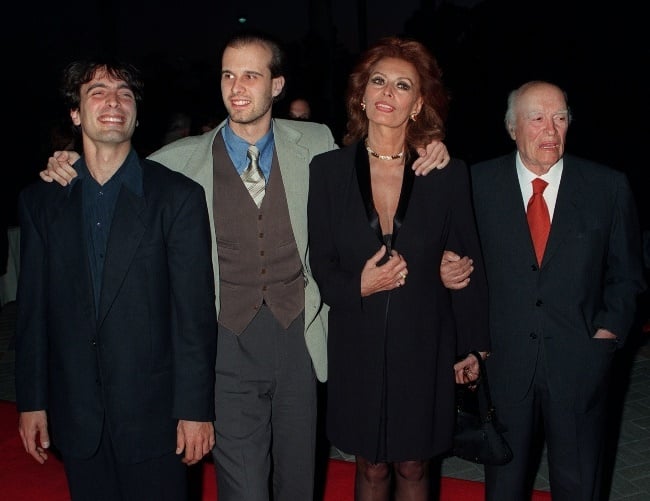 Sophia with her later husband Carlo (right) and tw
