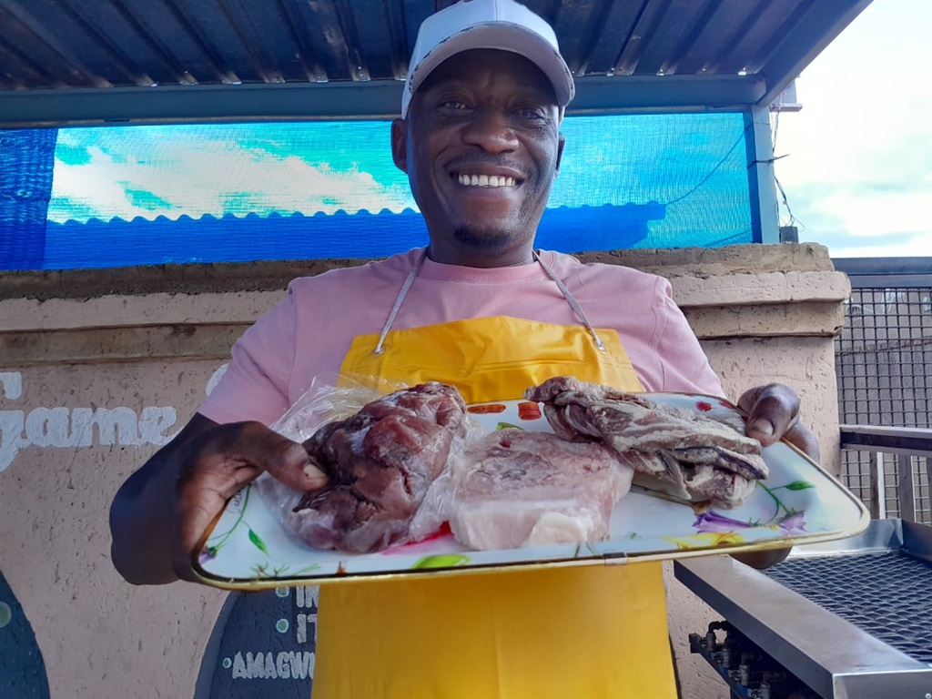 Sbusiso Tembe said the crocodile meat is delicious. Photo by Happy Mnguni
