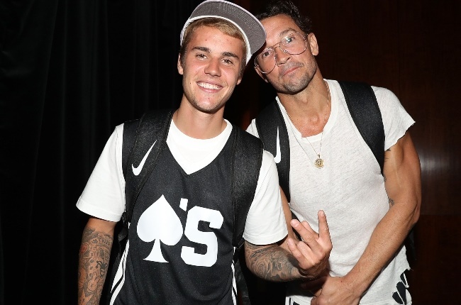 Justin Bieber and Carl Lentz attend a basketball match at Madison Square Garden, New York in 2017. CREDIT: GALLO IMAGES/GETTY IMAGES 