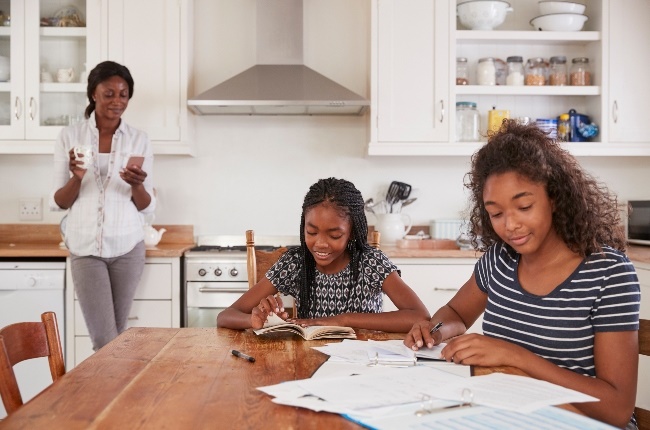 Parents should calmly encourage their children to keep going and help them with concepts they don’t understand. (Photo: Gallo Images/ Getty Images) 