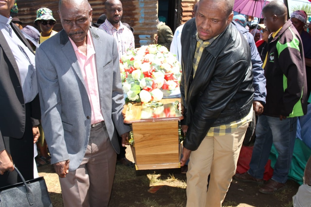 Pallbearers carrying the coffin of Bongiwe Mntshange during her funeral service in Boipatong on Tuesday. Photo by Tumelo Mofokeng