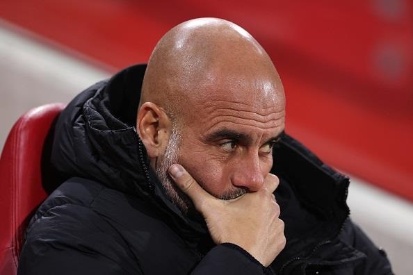 Manchester City boss Pep Guardiola will be without Kyle Walker and John Stones against Arsenal,
