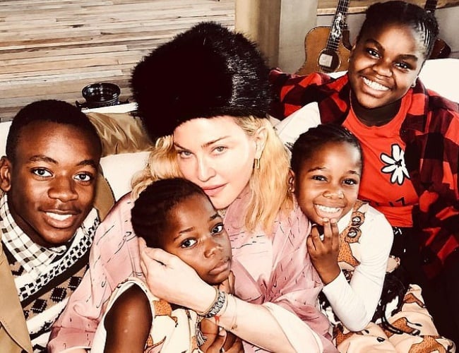 Four of Madonna's six children are adopted from Ma