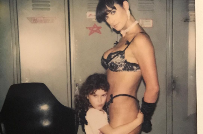 Rumer Willis hugs her mom Demi Moore in this iconic photo taken from the set of their 1995 movie Striptease to honour her mom's 58th birthday (Photo credit: Instagram/RumerWillis)