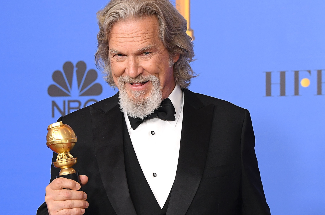 Jeff Bridges - seen here collecting his Best Actor Oscar in 2010 for his film, Crazy Heart - is battling lymphoma but remains upbeat. (Photo: Gallo Images/Getty Images)