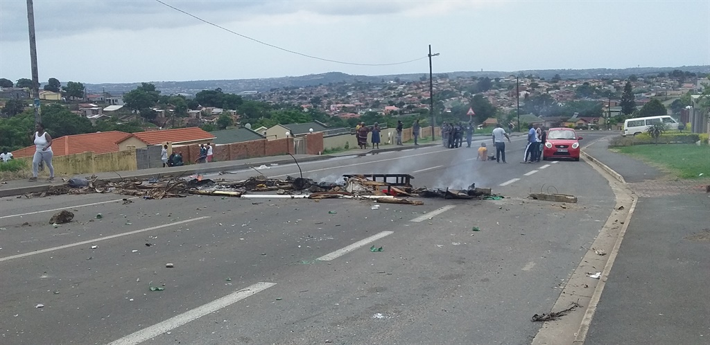 Residents blockaded the road demanding electricity. Photo: Mbali Dlungwana