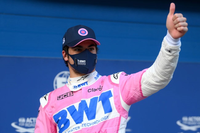 Pole position qualifier Lance Stroll of Canada and Racing Point celebrates in parc ferme during qualifying ahead of the F1 Grand Prix of Turkey at Intercity Istanbul Park on November 14, 2020 in Istanbul, Turkey. 