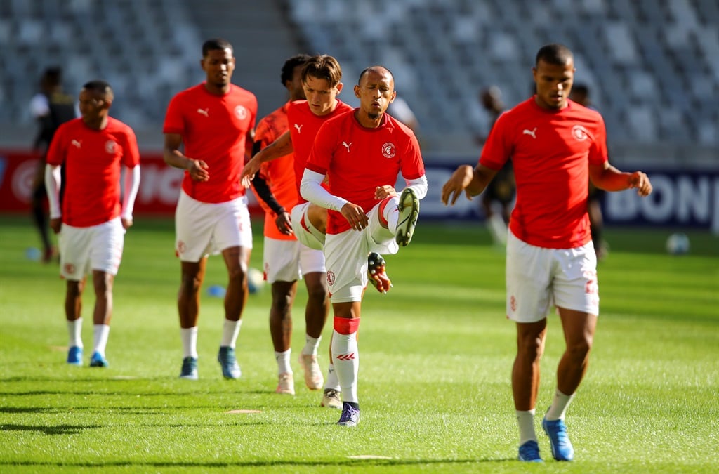 CAPE TOWN, SOUTH AFRICA - NOVEMBER 25: Cape Town Spurs players warm up during the DStv Premiership match between Cape Town Spurs and Royal AM at DHL Cape Town Stadium on November 25, 2023 in Cape Town, South Africa. (Photo by Roger Sedres/Gallo Images)