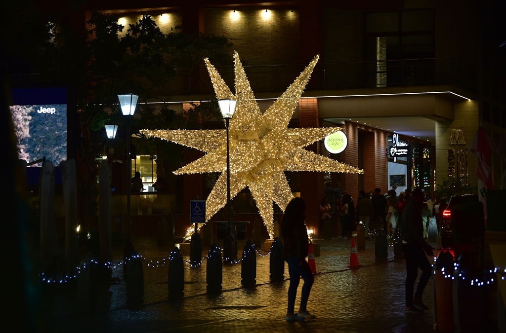 Melrose Arch has been transformed into a Christmas wonderland, making for a magical night out for young and old. The large colourful light displays will decorate Melrose Arch until 7 January 2024. Photo by Trevor Kunene